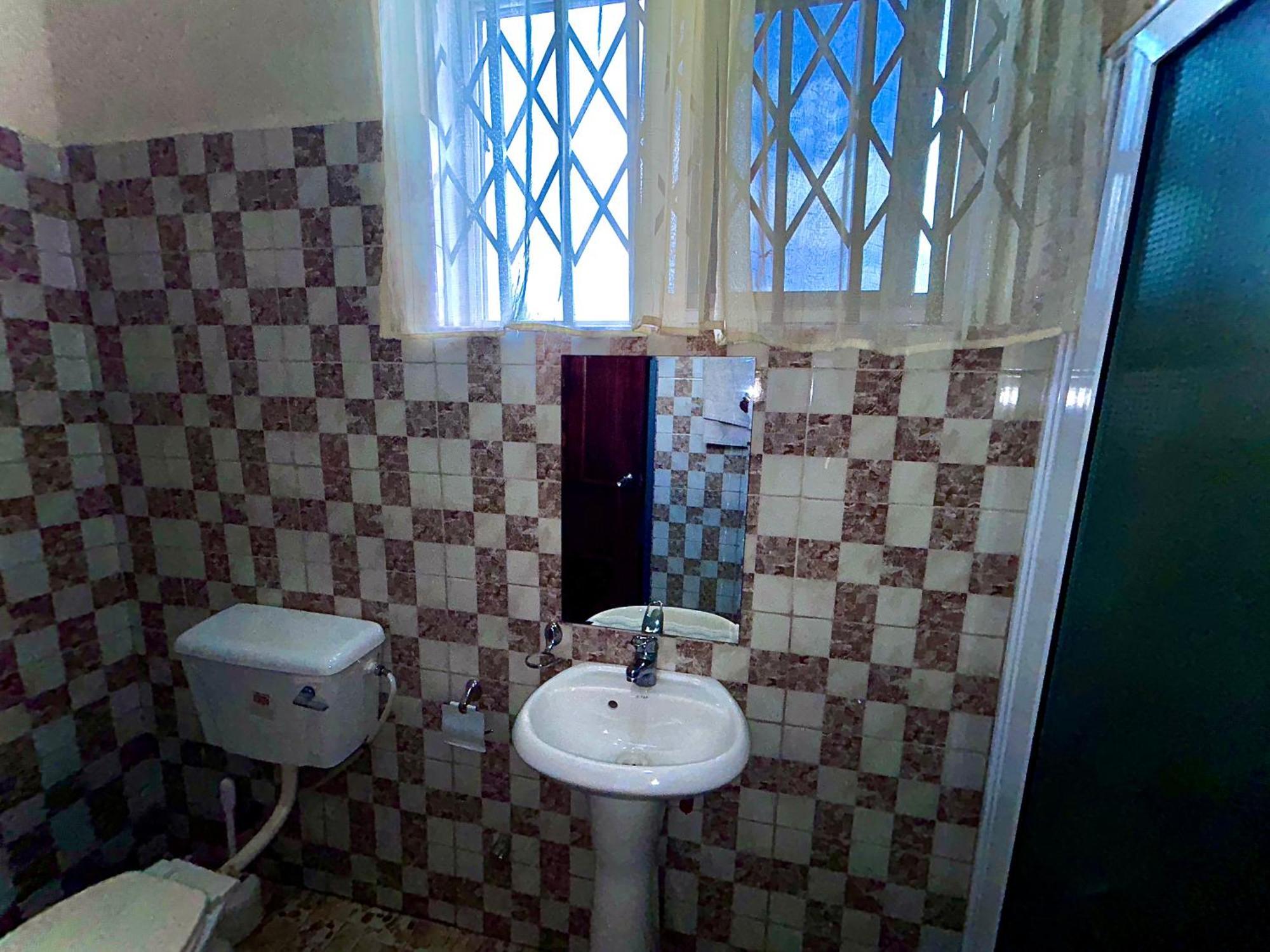 Jessie Hotel Adenta Phòng bức ảnh